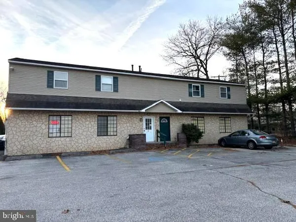 front view of a house with a street