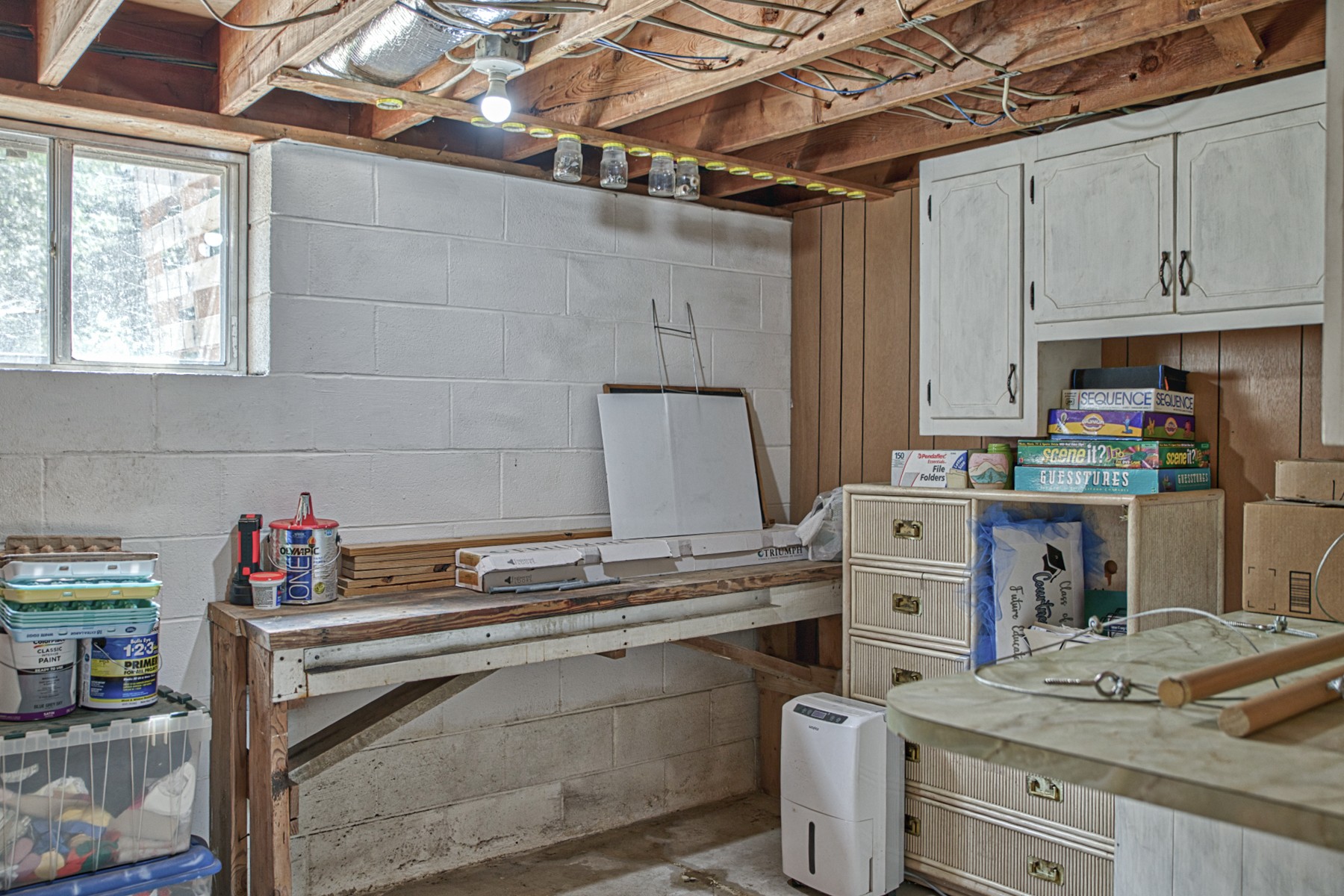 260 Fate Ivy Road Monterey, TN 38574 - Photo 18 of 32 a kitchen with granite countertop a sink stove and cabinets