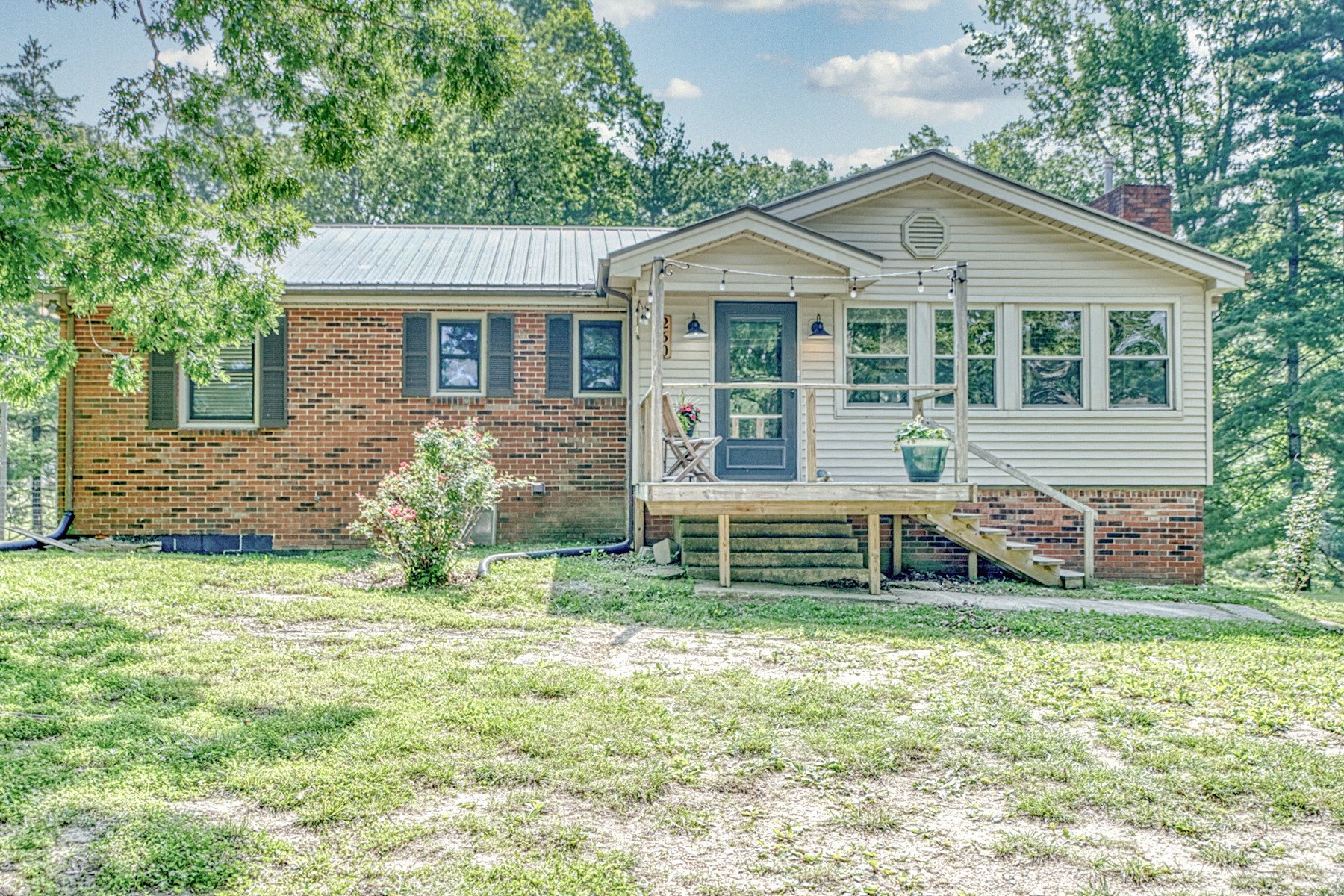 260 Fate Ivy Road Monterey, TN 38574 - Photo 2 of 32 a front view of a house with a yard