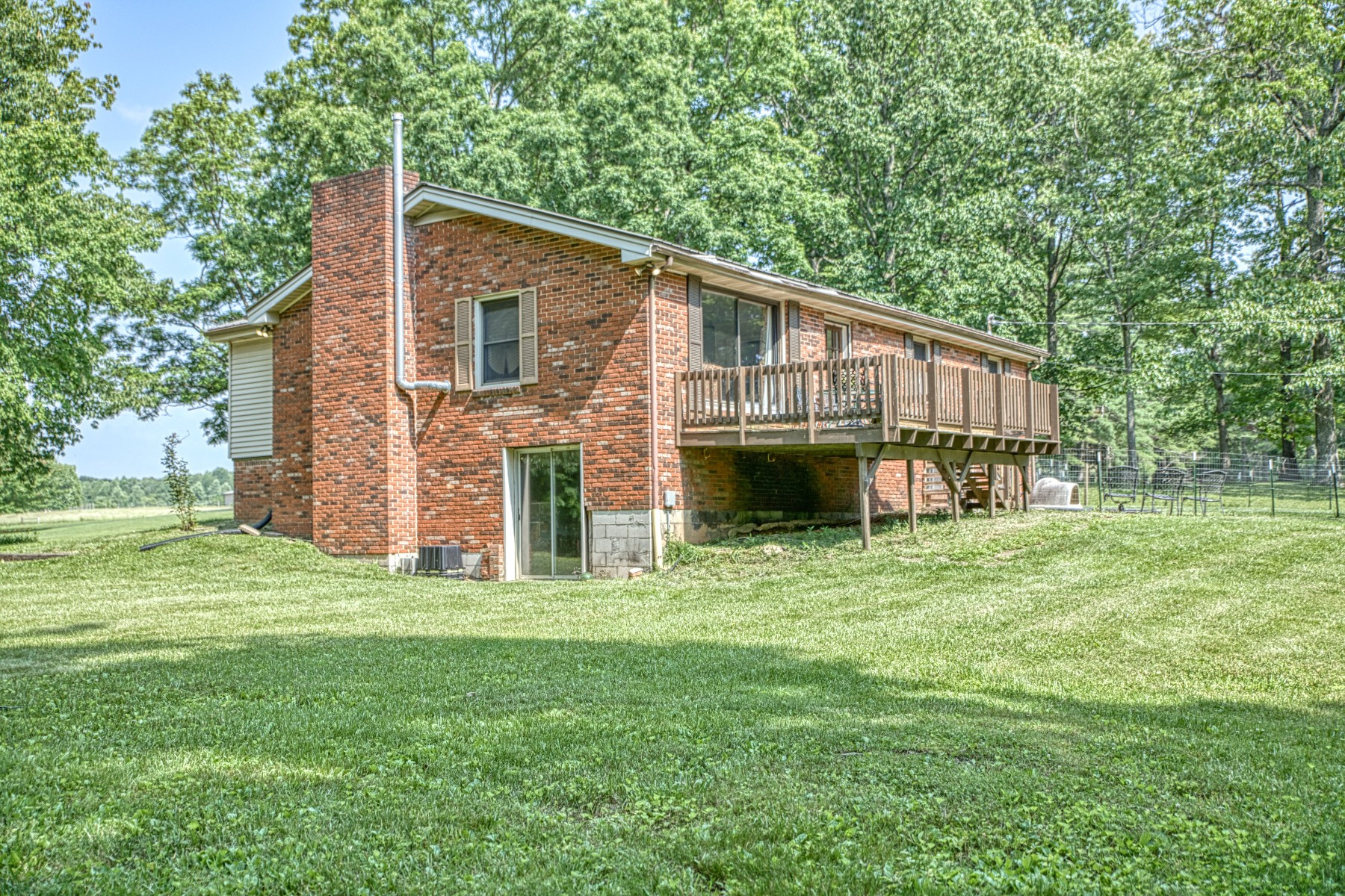 260 Fate Ivy Road Monterey, TN 38574 - Photo 21 of 32 a view of a house with a backyard