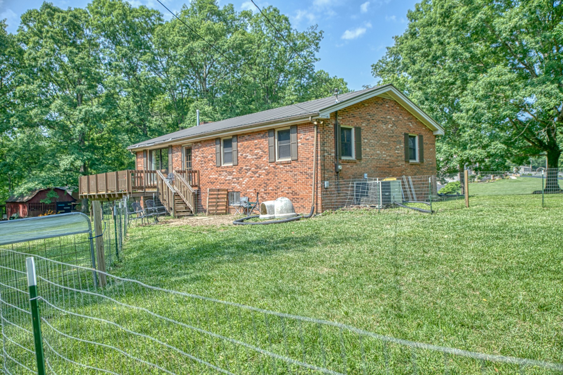 260 Fate Ivy Road Monterey, TN 38574 - Photo 24 of 32 a front view of house with backyard and green space
