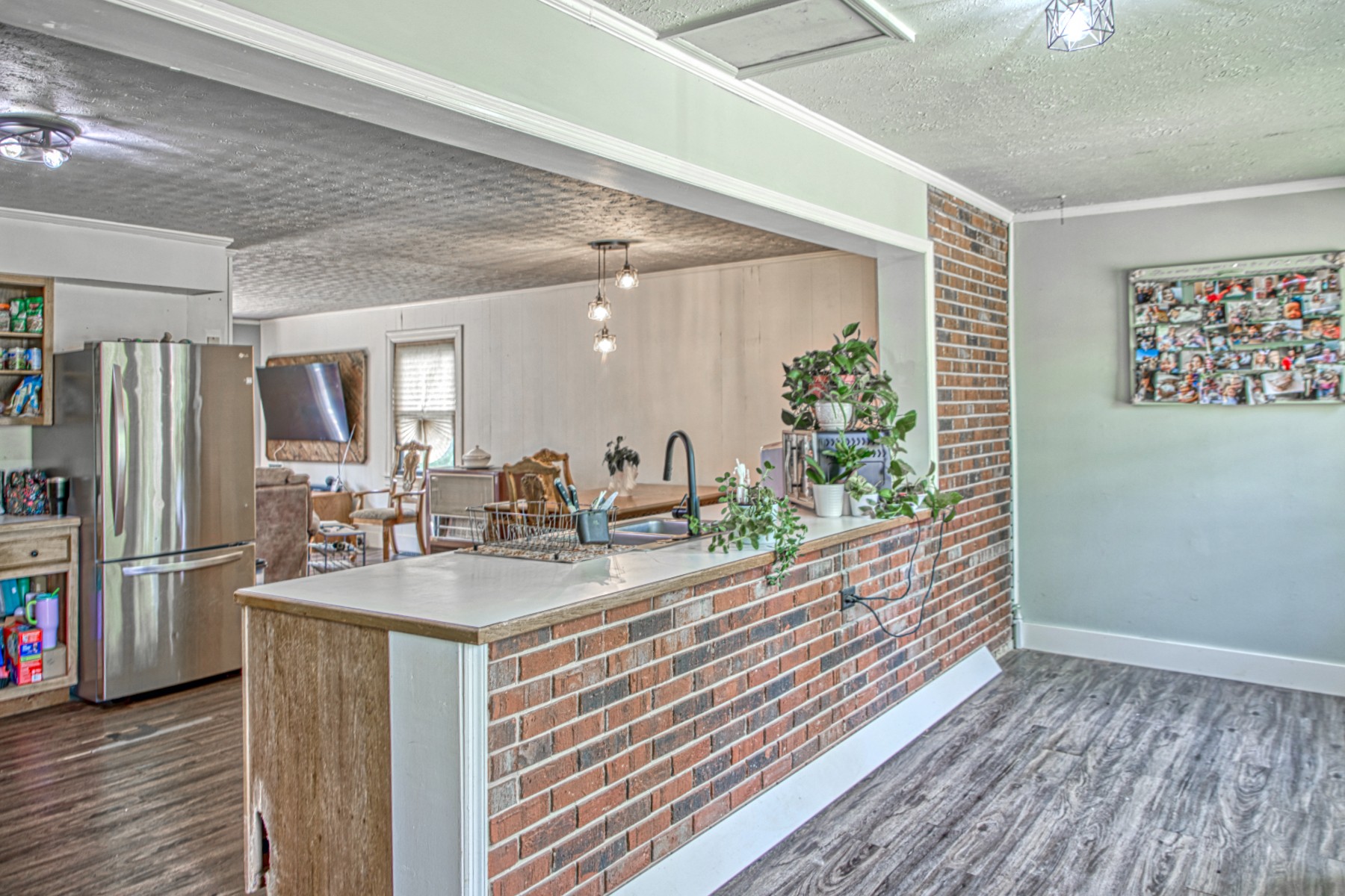 260 Fate Ivy Road Monterey, TN 38574 - Photo 4 of 32 a kitchen with stainless steel appliances granite countertop a refrigerator and a stove