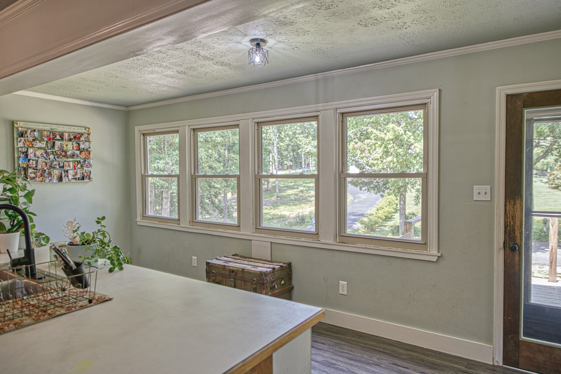 260 Fate Ivy Road Monterey, TN 38574 - Photo 7 of 32 a bathroom with a granite countertop sink and a window