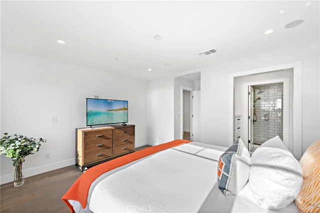 a bathroom with a sink double vanity and a shower