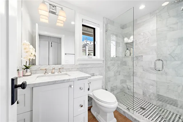 a view of a patio with a table and chairs