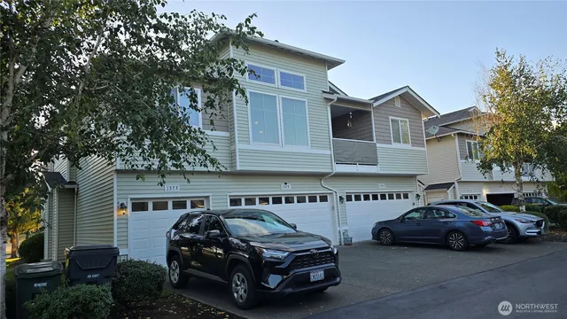 a car parked in front of a house