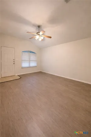 a kitchen with appliances and cabinets