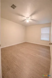 a bathroom with a sink a toilet and bathtub