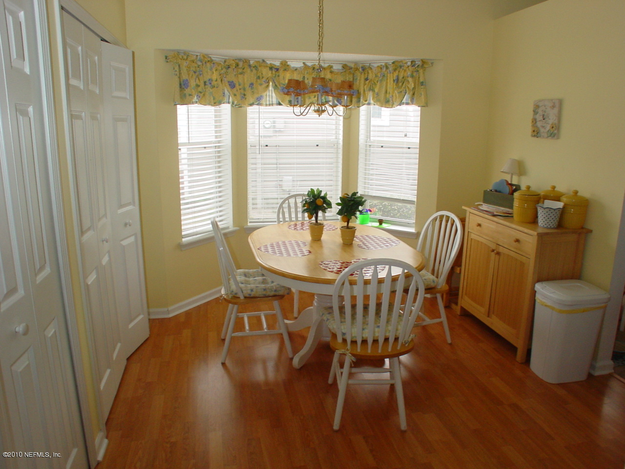 8774 E Spring Jacksonville, FL 32244 - Photo 6 of 8 a view of a dining room with furniture window and outside view