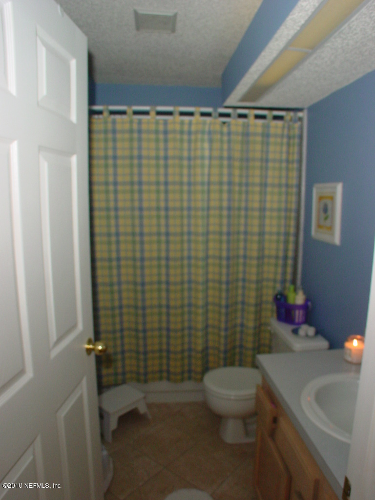 8774 E Spring Jacksonville, FL 32244 - Photo 8 of 8 a bathroom with a sink and toilet