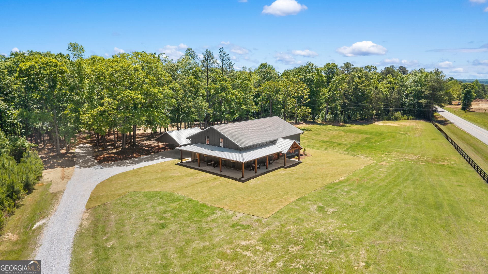 5938 Ridgeway Road Franklin, GA 30217 - Photo 35 of 41 a view of a swimming pool with an outdoor space and seating area