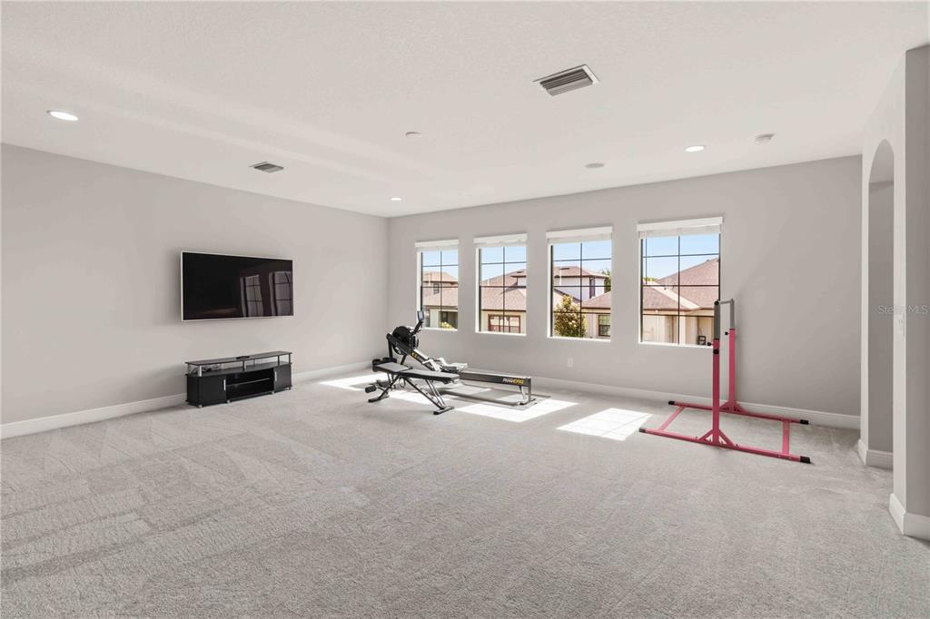 805 Viscount Street Brandon, FL 33511 - Photo 22 of 46 a view of a livingroom with a flat screen tv