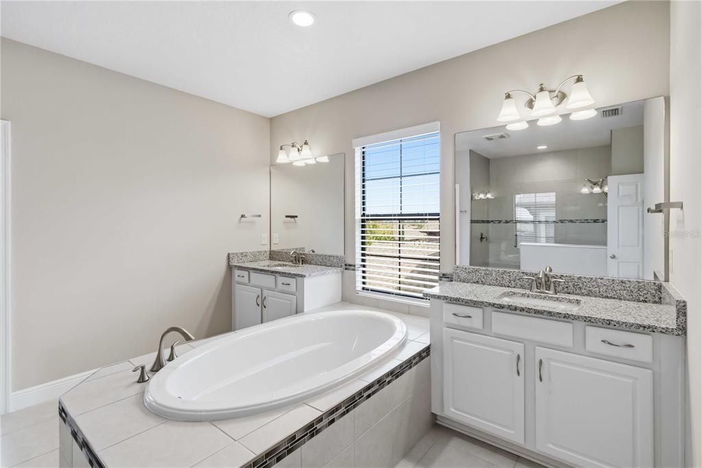 805 Viscount Street Brandon, FL 33511 - Photo 26 of 46 a bathroom with a sink and a mirror