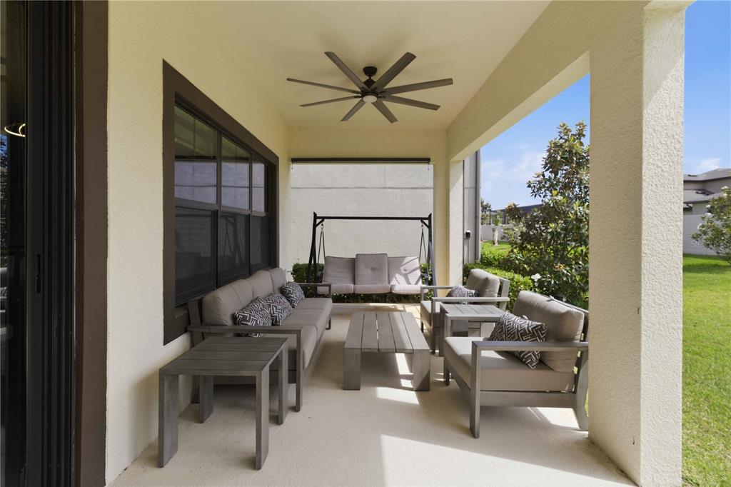 805 Viscount Street Brandon, FL 33511 - Photo 35 of 46 a living room with furniture and a large window