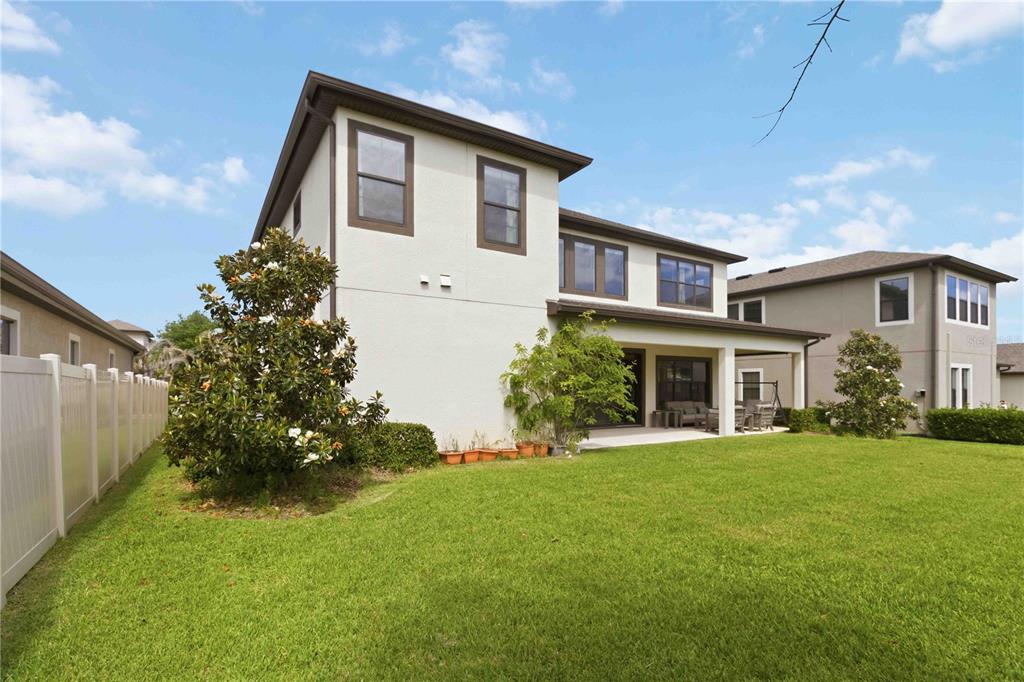 805 Viscount Street Brandon, FL 33511 - Photo 40 of 46 a front view of a house with a garden