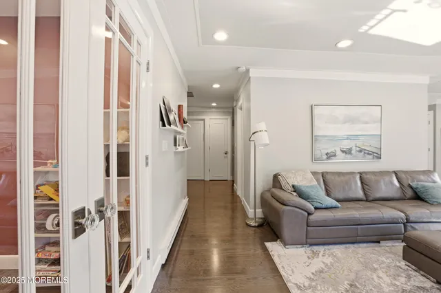 a living room with furniture and a rug
