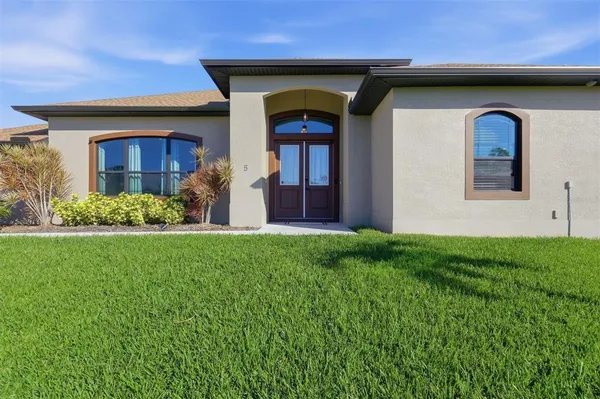 a front view of house with yard