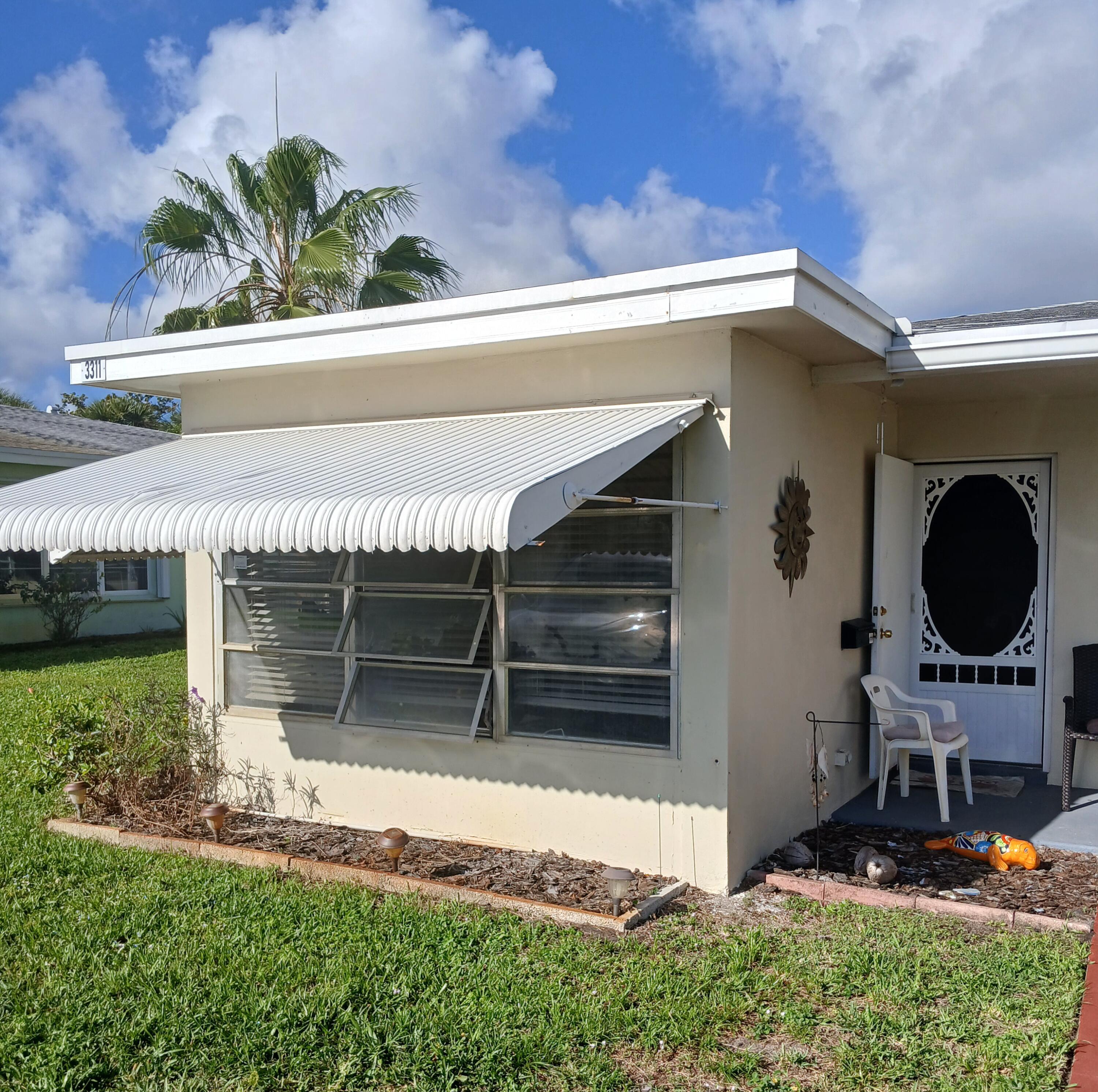 3311 Valley Road, Unit D Boynton Beach, FL 33435 - Photo 1 of 32 Front3311