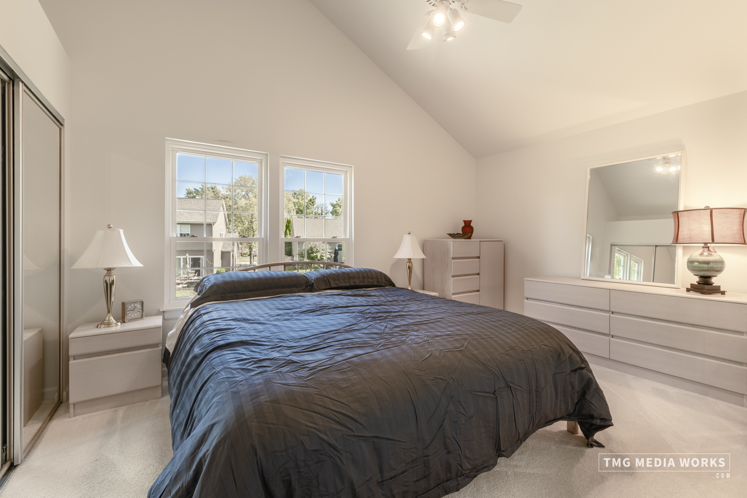 300 Churchill Lane Aurora, IL 60504 - Photo 19 of 30 a bedroom with a bed and a large window