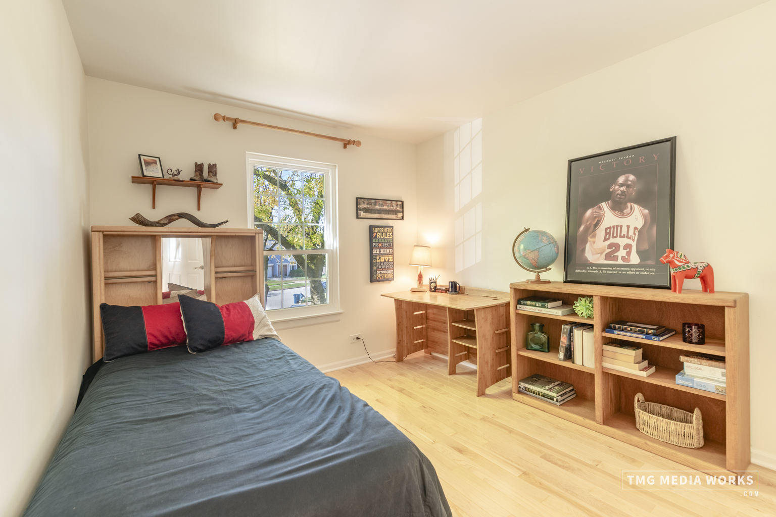 300 Churchill Lane Aurora, IL 60504 - Photo 23 of 30 a bedroom with a bed and wooden floor