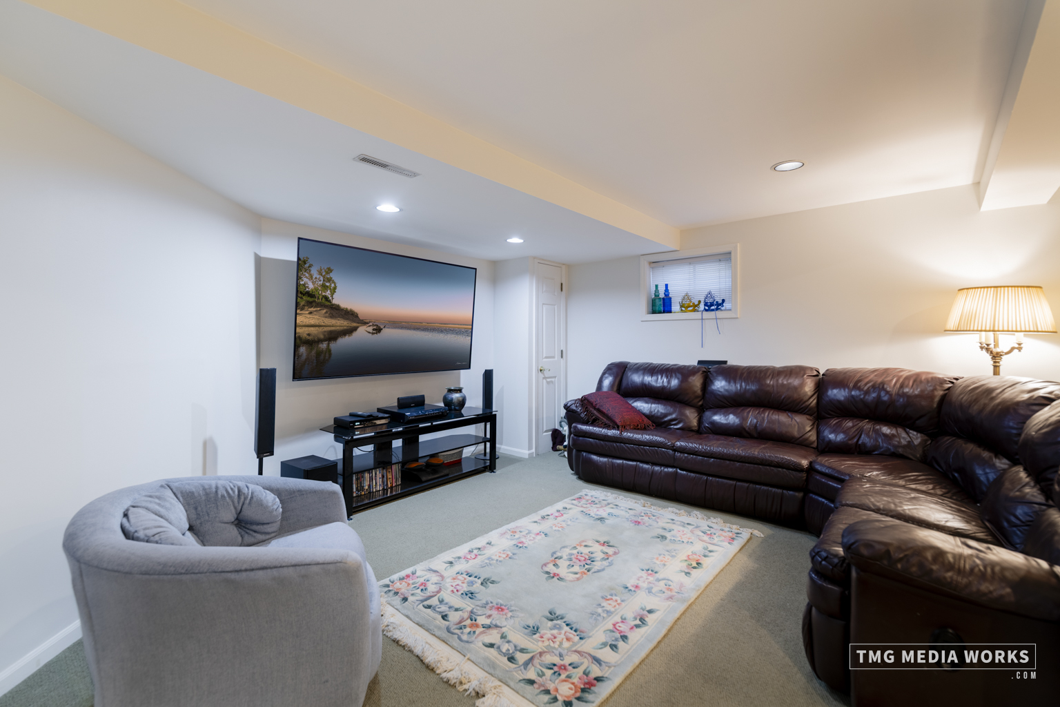 300 Churchill Lane Aurora, IL 60504 - Photo 25 of 30 a living room with furniture and a flat screen tv