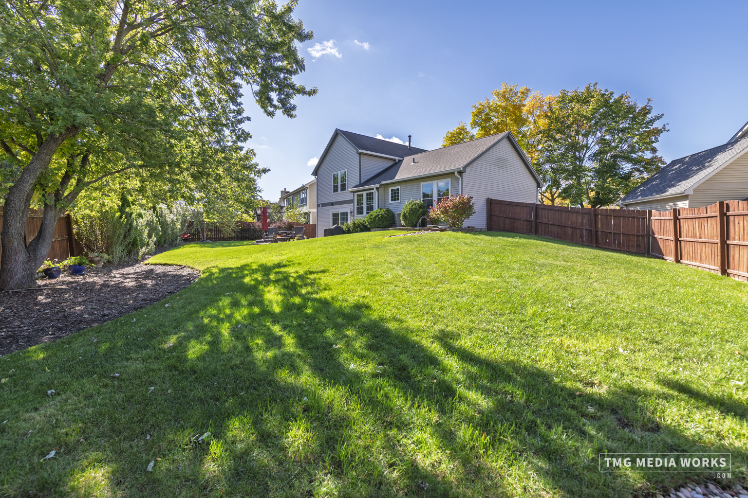 300 Churchill Lane Aurora, IL 60504 - Photo 5 of 30 a house with a big yard and large trees