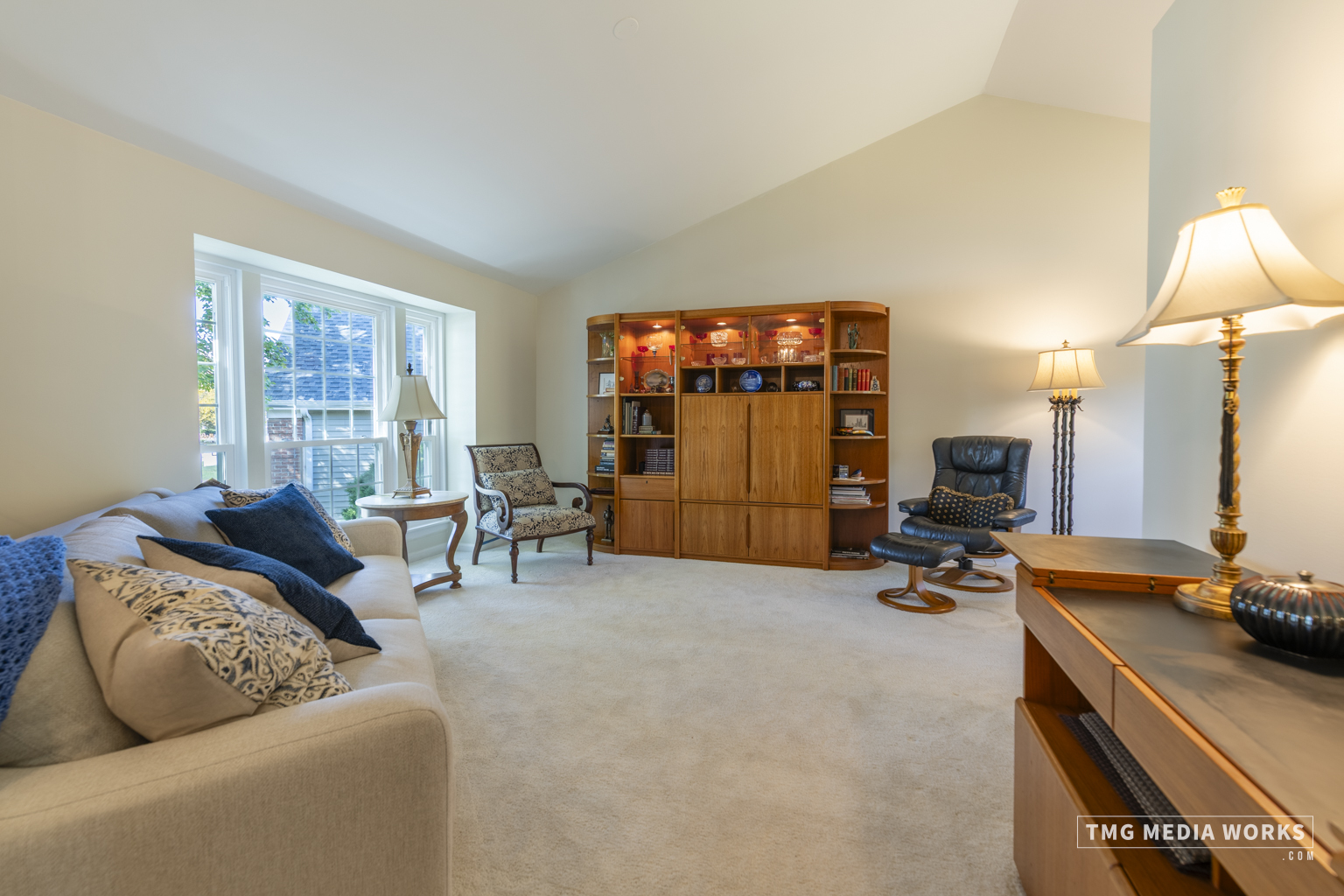 300 Churchill Lane Aurora, IL 60504 - Photo 9 of 30 a living room with furniture gym equipment and a large window