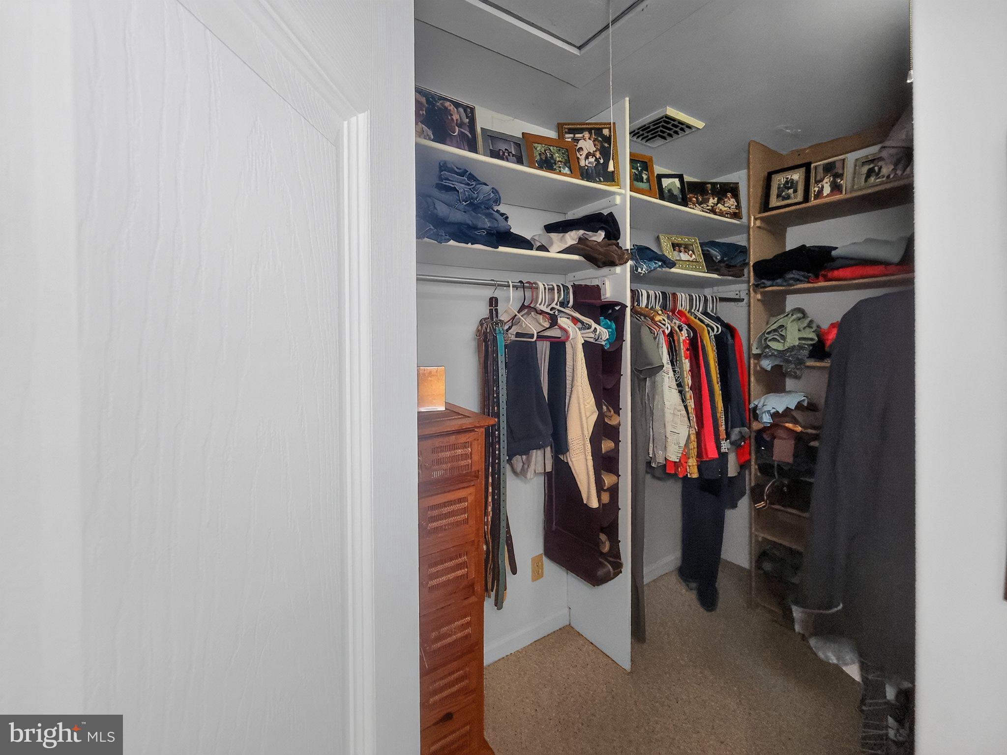 5214 David Greene Road Cambridge, MD 21613 - Photo 24 of 73 Spacious closet with organized storage.