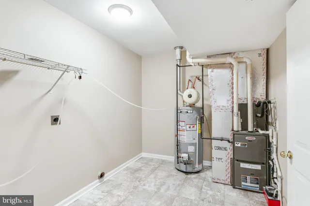 a view of a house with a yard and garage