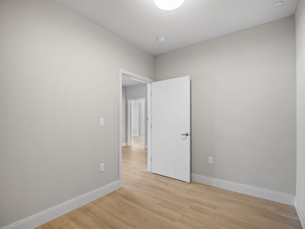 249 Corey Road, Unit 105 Boston, MA 02135 - Photo 11 of 39 a view of an empty room