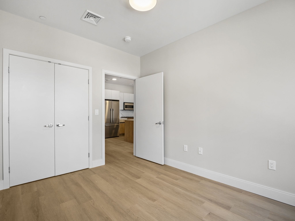 249 Corey Road, Unit 105 Boston, MA 02135 - Photo 14 of 39 a view of an empty room