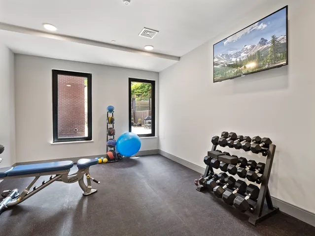 a view of room with toys and air hockey table