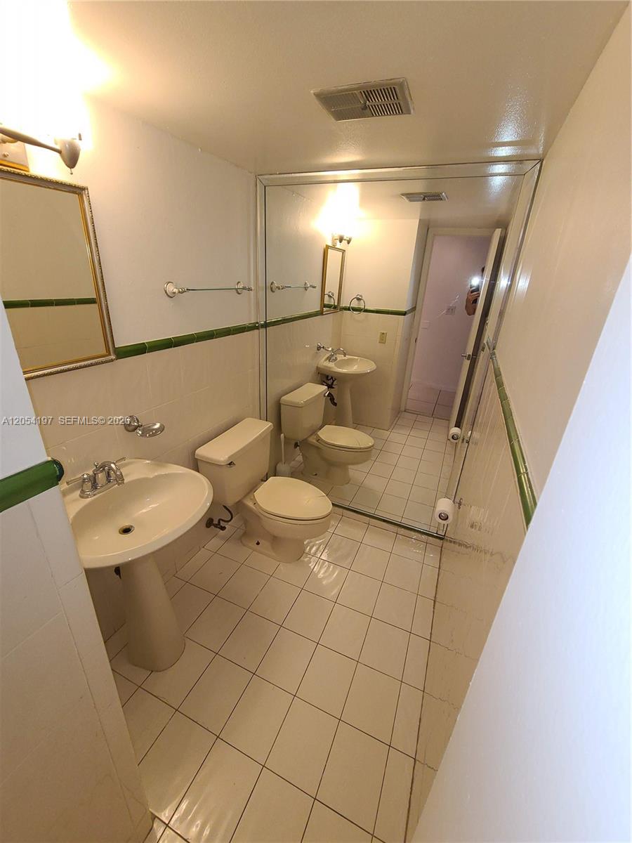 1605 Bay Road, Unit 206 Miami Beach, FL 33139 - Photo 15 of 43 Guest Bathroom / Powder room