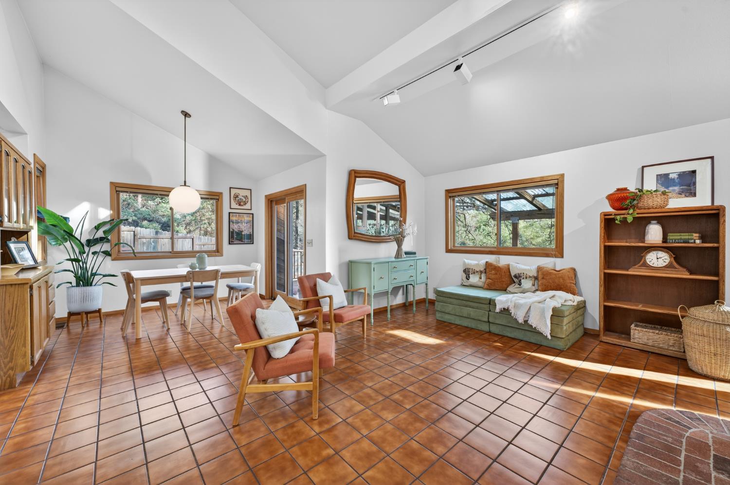 18370 Norlene Way Grass Valley, CA 95949 - Photo 11 of 46 a living room with furniture a window and a flat screen tv