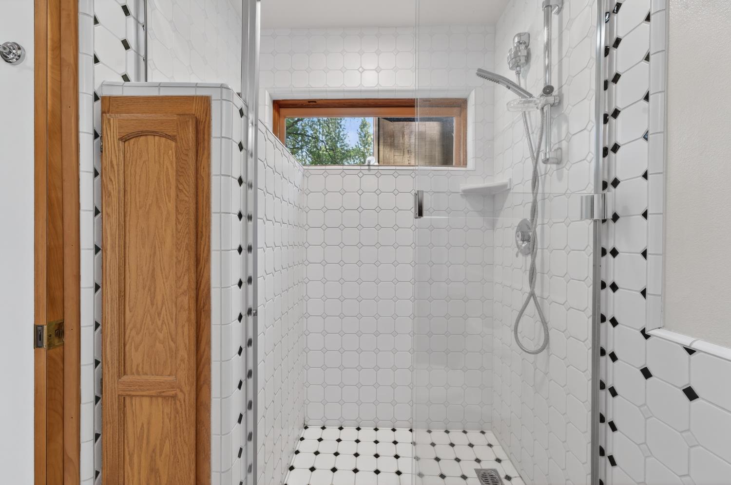 18370 Norlene Way Grass Valley, CA 95949 - Photo 16 of 46 a bathroom with a shower