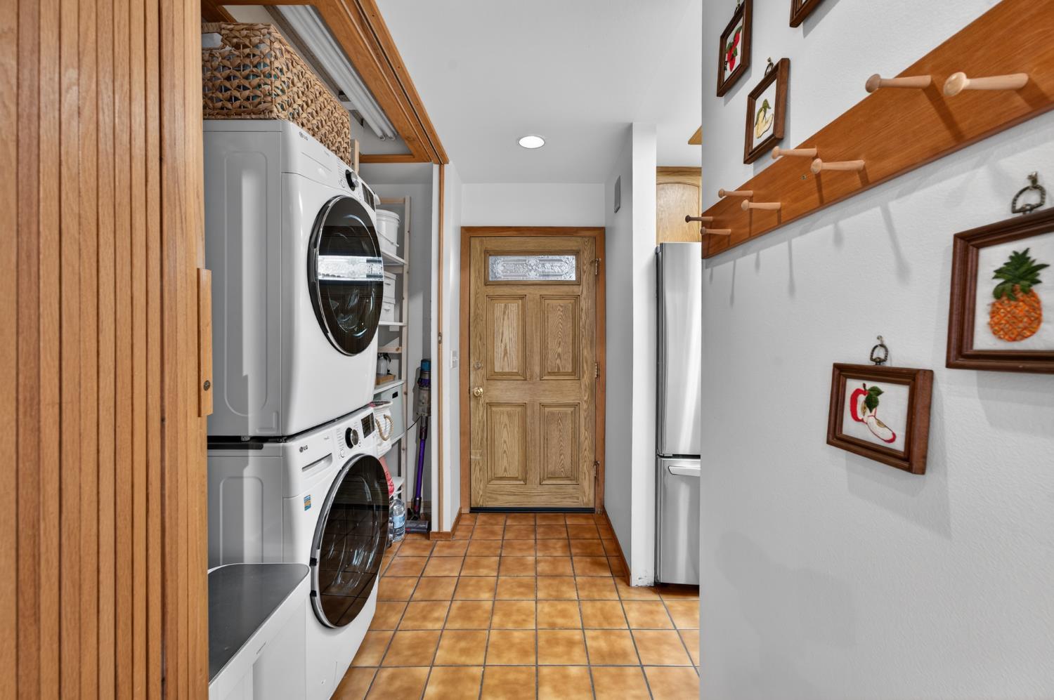 18370 Norlene Way Grass Valley, CA 95949 - Photo 18 of 46 a view of a hallway with washer and dryer