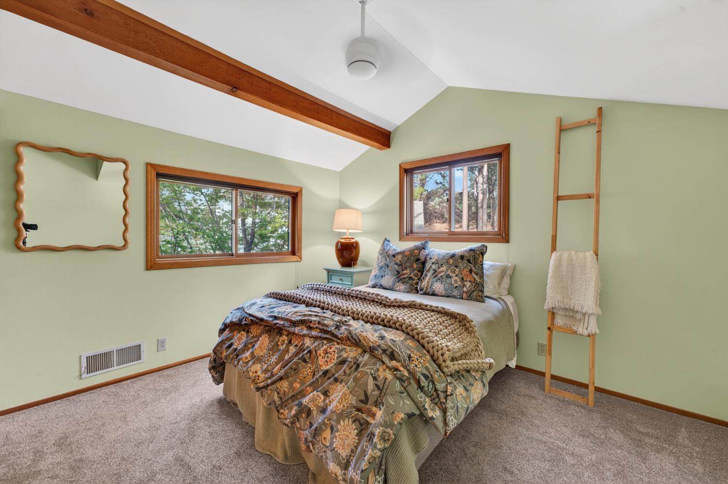 18370 Norlene Way Grass Valley, CA 95949 - Photo 21 of 46 a bed sitting in a bedroom next to a window