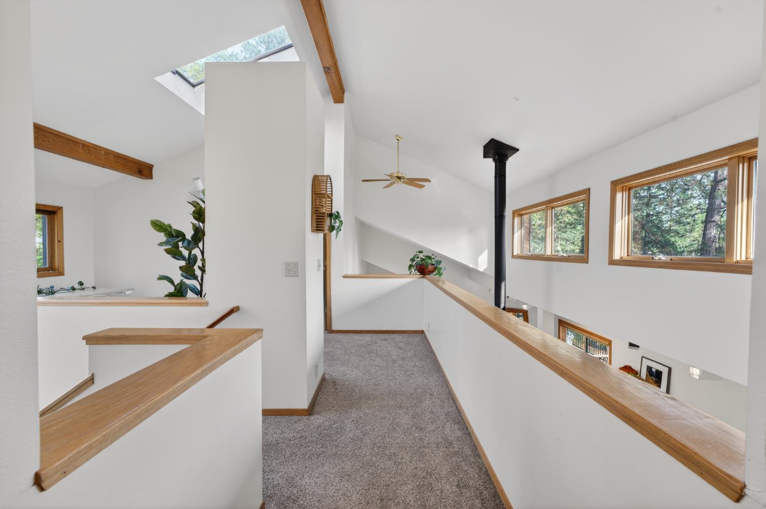 18370 Norlene Way Grass Valley, CA 95949 - Photo 23 of 46 a view of a kitchen with kitchen island and windows