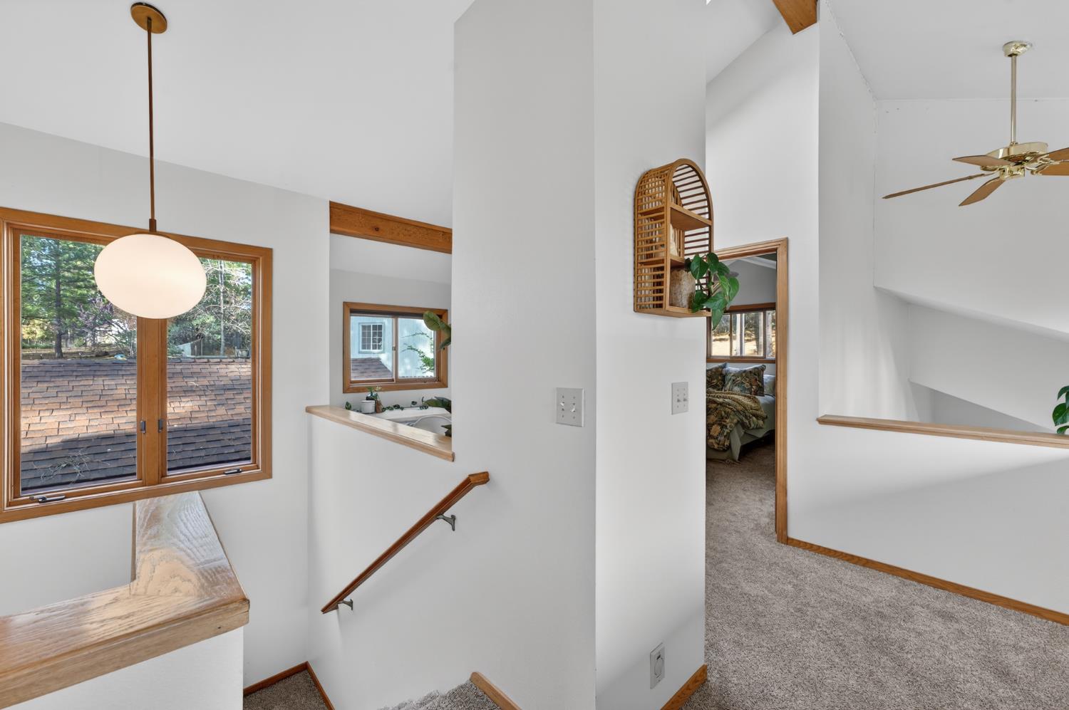 18370 Norlene Way Grass Valley, CA 95949 - Photo 27 of 46 a view of a hallway with entryway dining room and chandelier