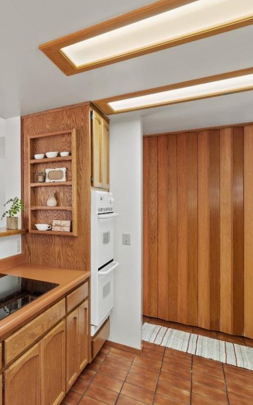 18370 Norlene Way Grass Valley, CA 95949 - Photo 40 of 46 a kitchen with stainless steel appliances granite countertop a refrigerator and a sink
