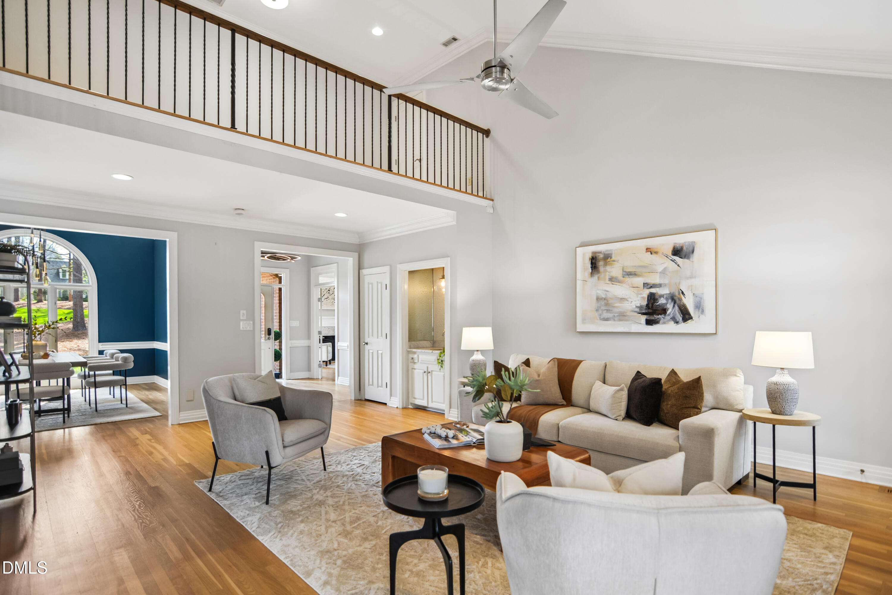 9933 Koupela Drive Raleigh, NC 27614 - Photo 14 of 59 a living room with furniture and wooden floor