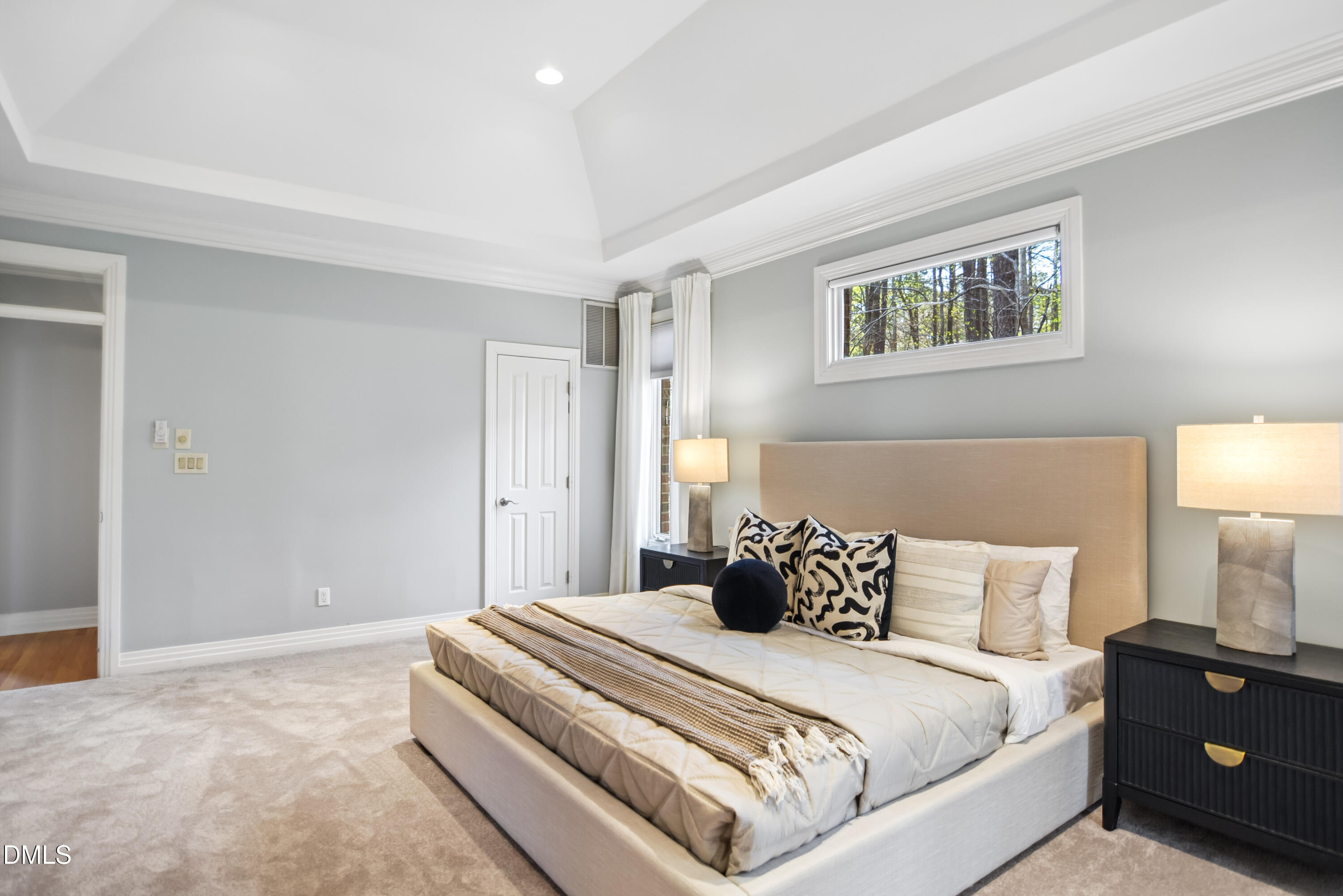 9933 Koupela Drive Raleigh, NC 27614 - Photo 23 of 59 a bedroom with a bed and a night lamp