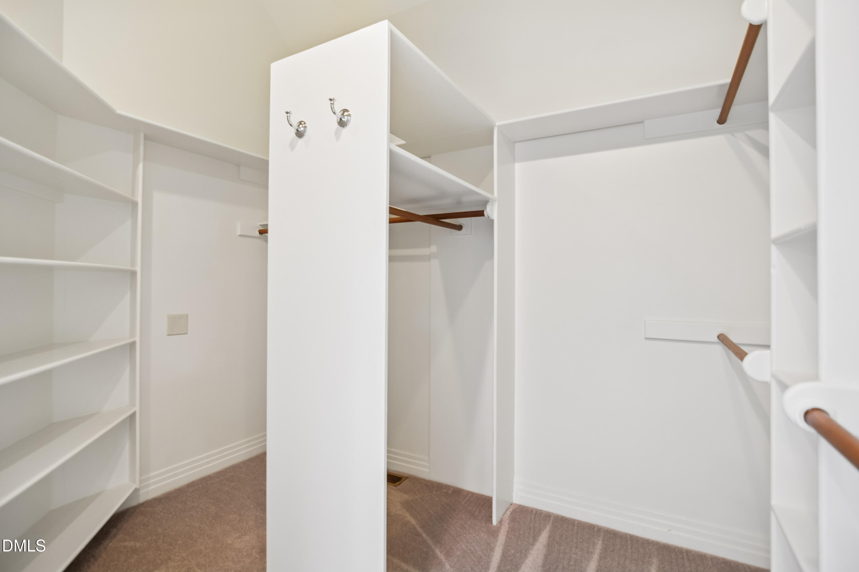9933 Koupela Drive Raleigh, NC 27614 - Photo 29 of 59 a view of walk in closet with white walls