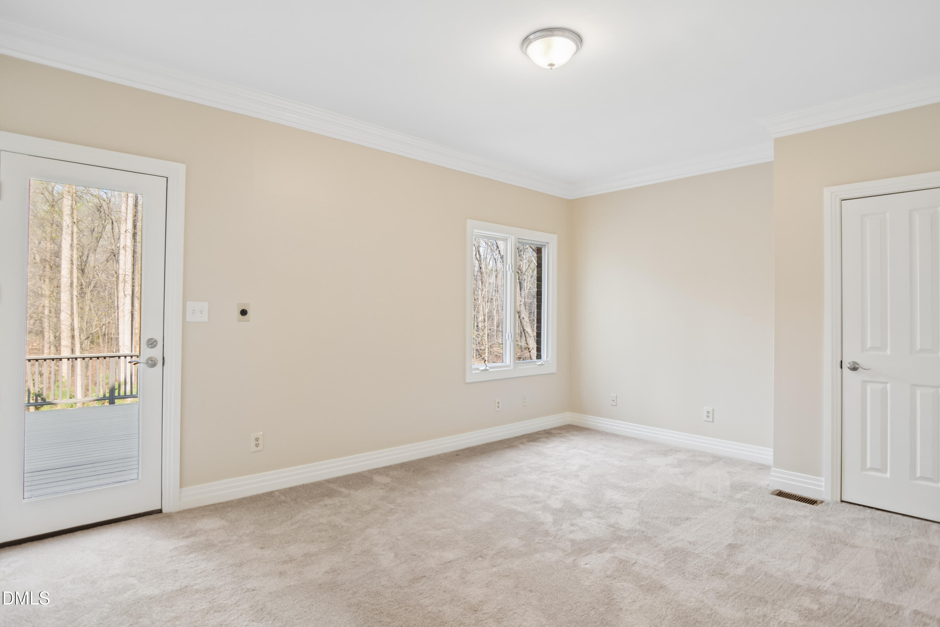 9933 Koupela Drive Raleigh, NC 27614 - Photo 31 of 59 an empty room with windows