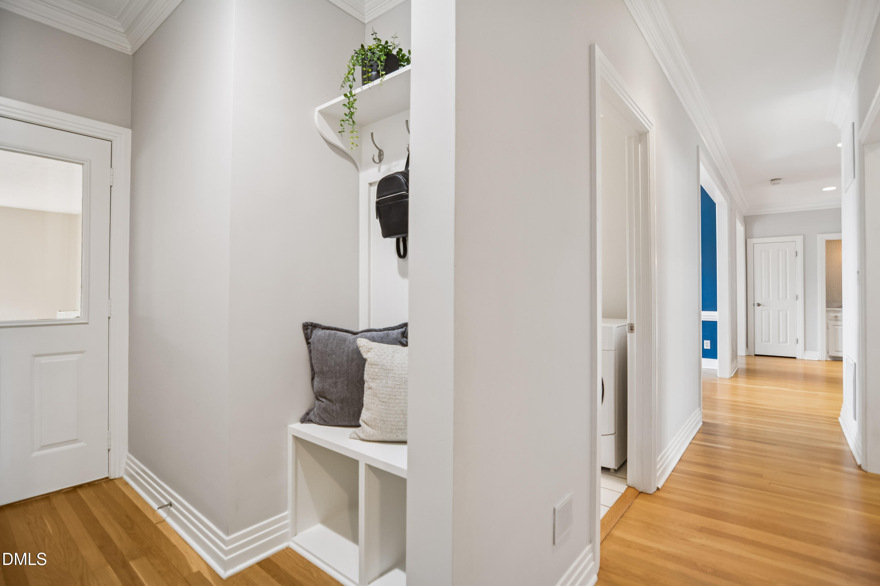 9933 Koupela Drive Raleigh, NC 27614 - Photo 33 of 59 a view of a room with wooden floor and staircase