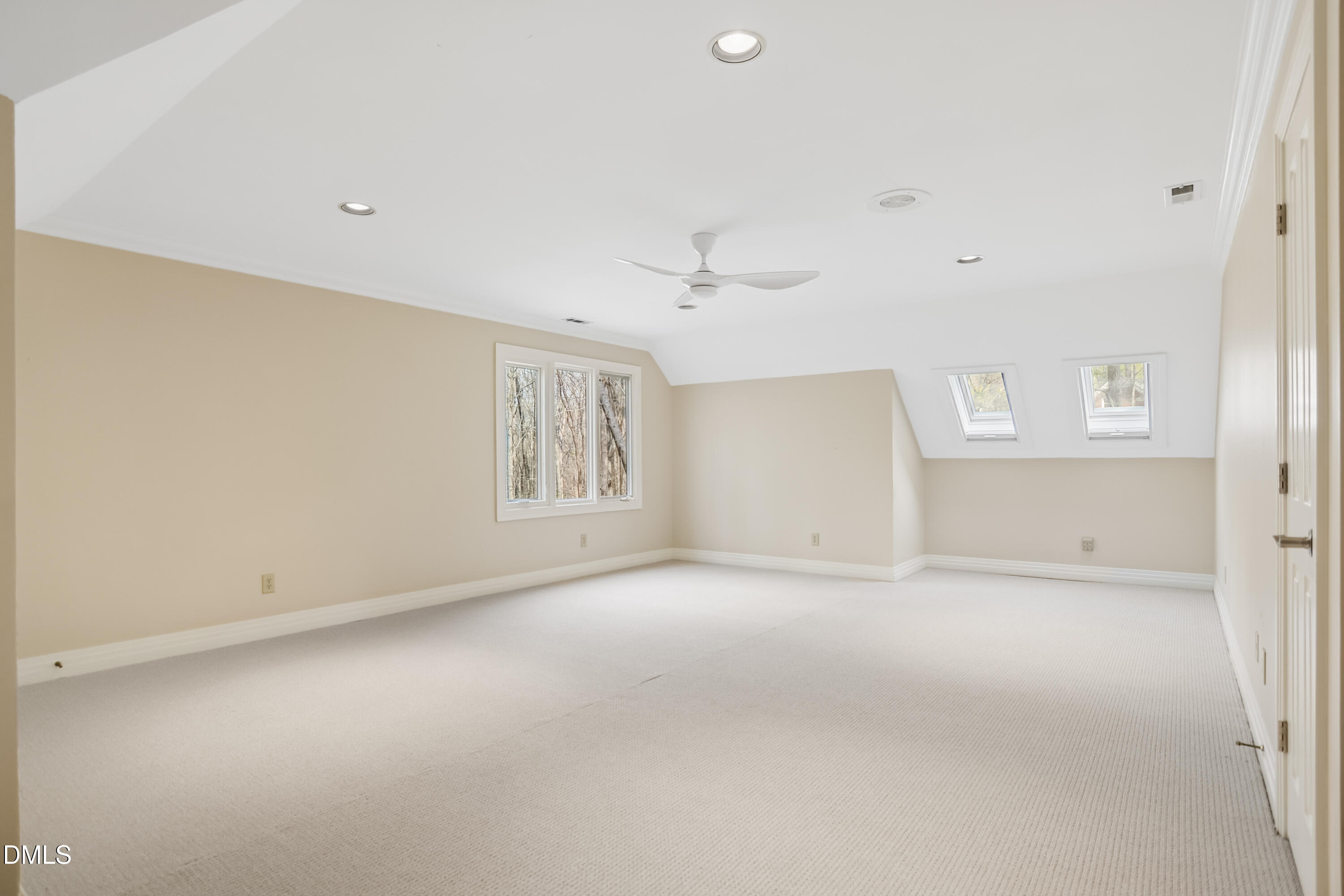 9933 Koupela Drive Raleigh, NC 27614 - Photo 36 of 59 an empty room with windows and closet