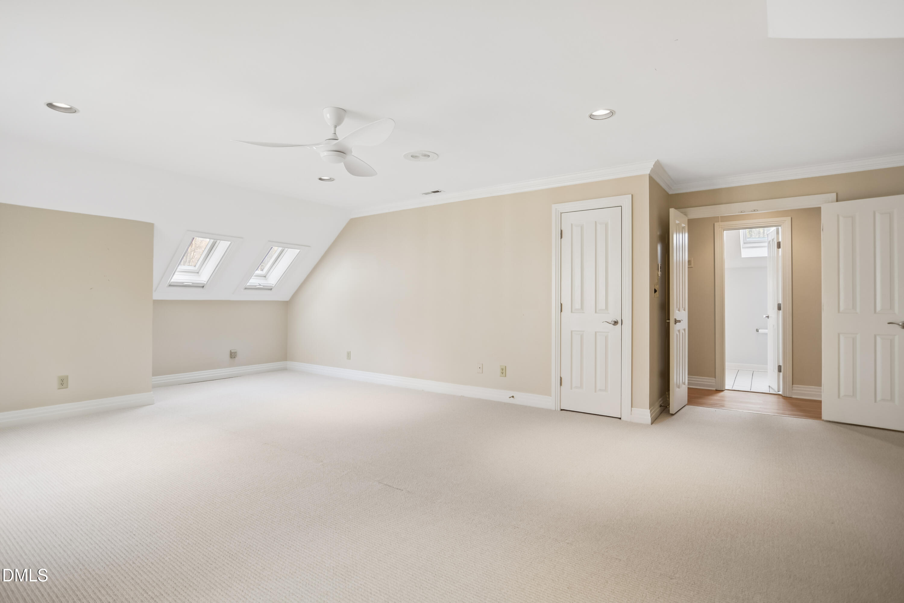 9933 Koupela Drive Raleigh, NC 27614 - Photo 37 of 59 an empty room with a empty space and windows