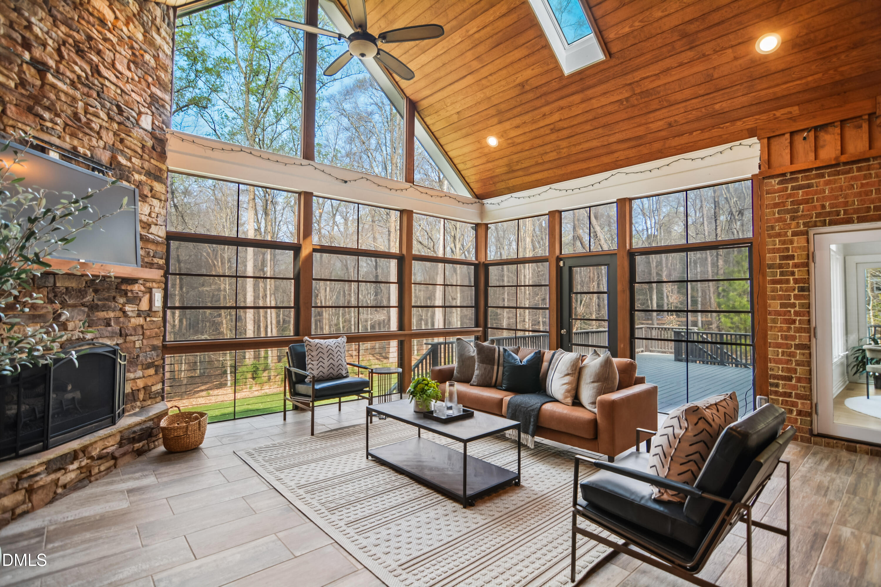 9933 Koupela Drive Raleigh, NC 27614 - Photo 48 of 59 a balcony with furniture and a potted plant