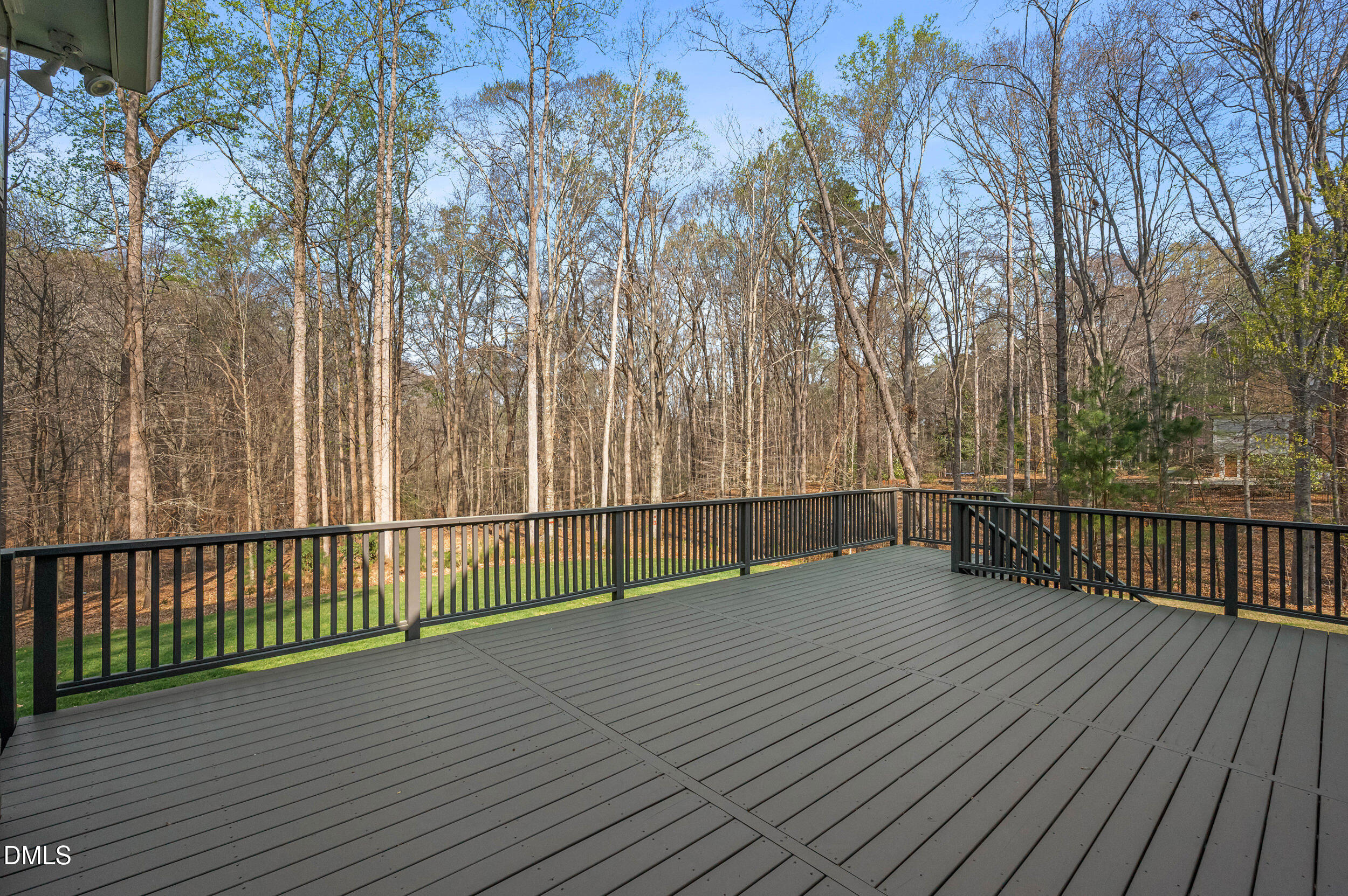 9933 Koupela Drive Raleigh, NC 27614 - Photo 50 of 59 a view of backyard with a deck