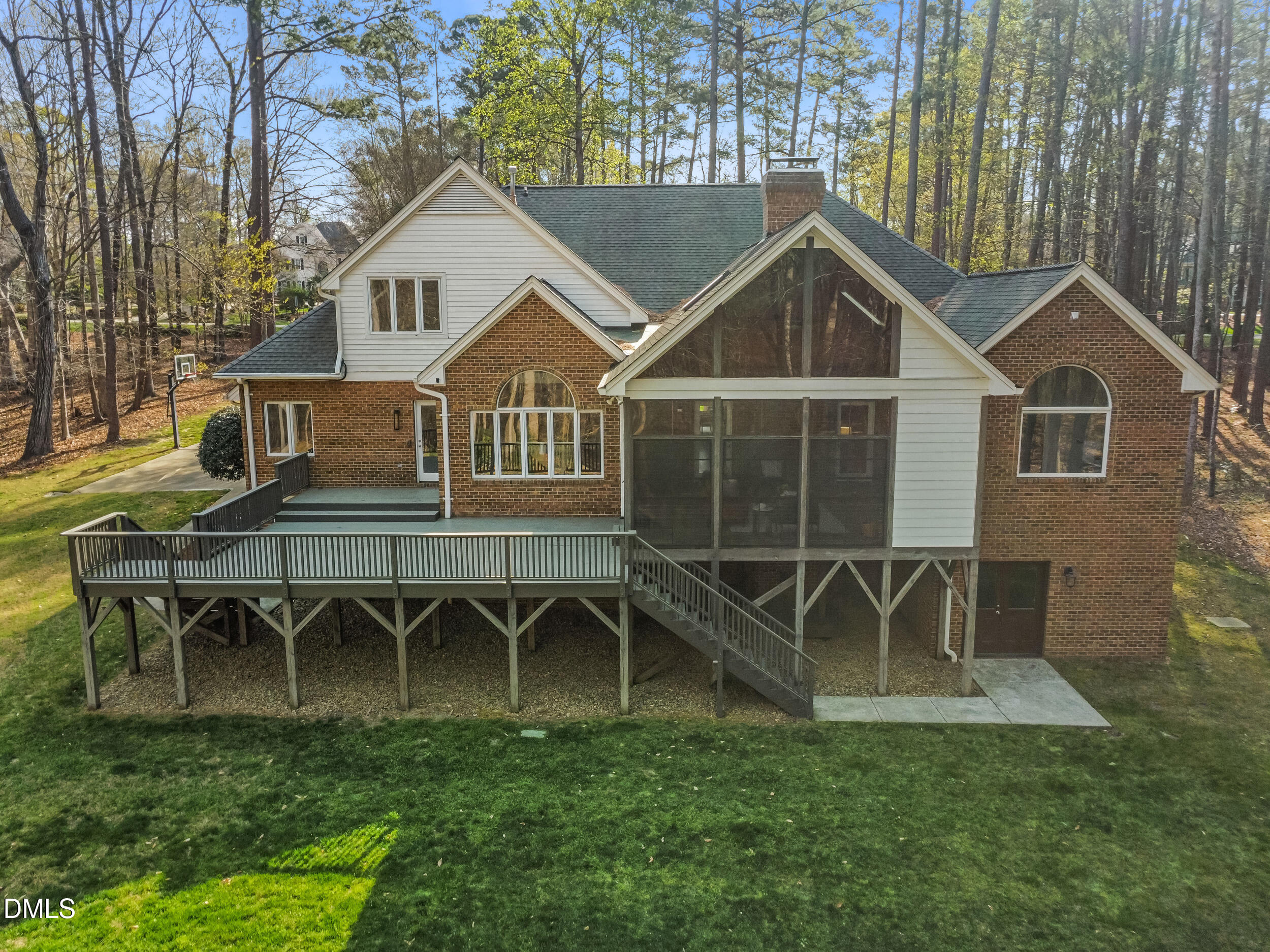 9933 Koupela Drive Raleigh, NC 27614 - Photo 56 of 59 a front view of a house with a yard and many windows